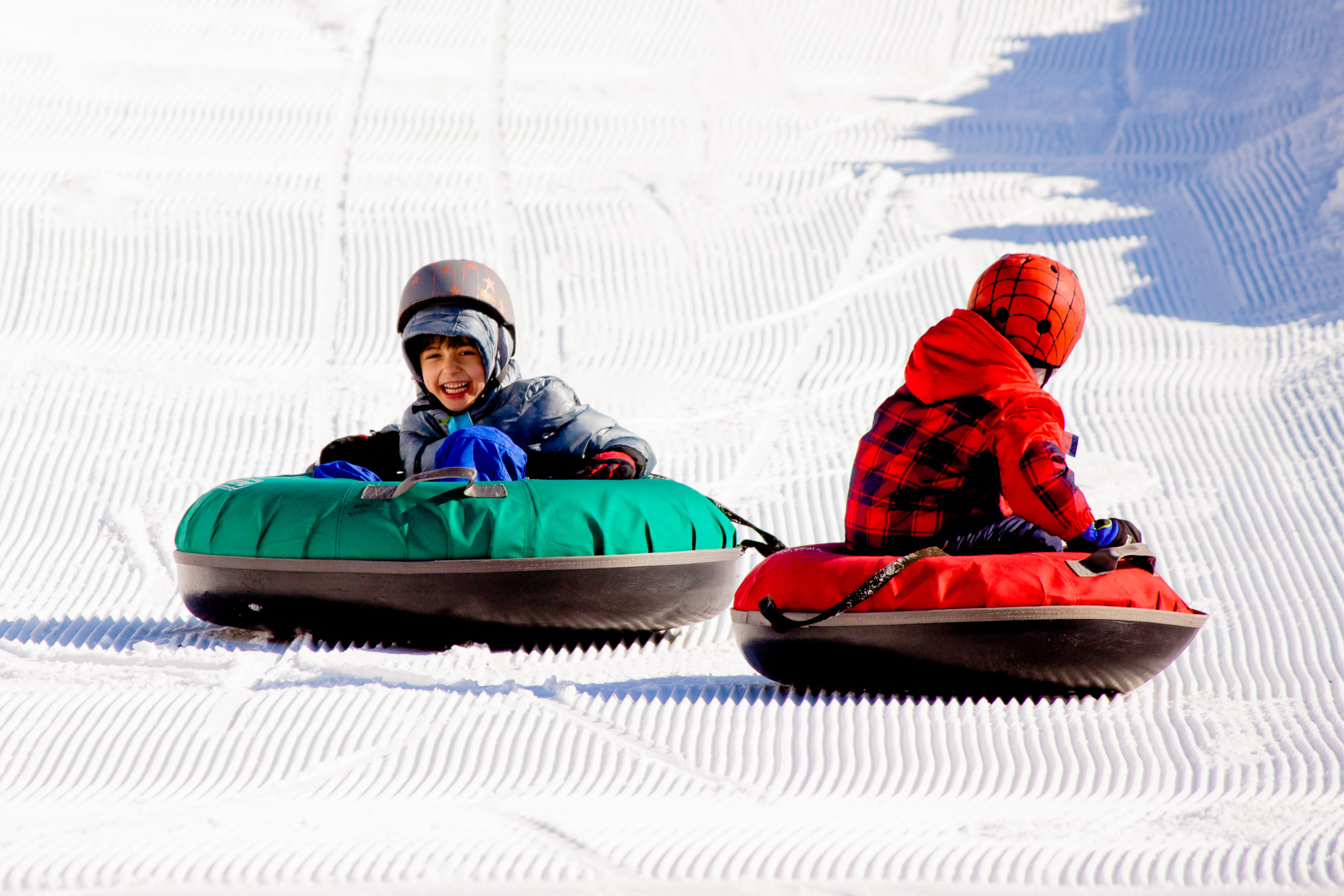 Students tubing at winter adventure day