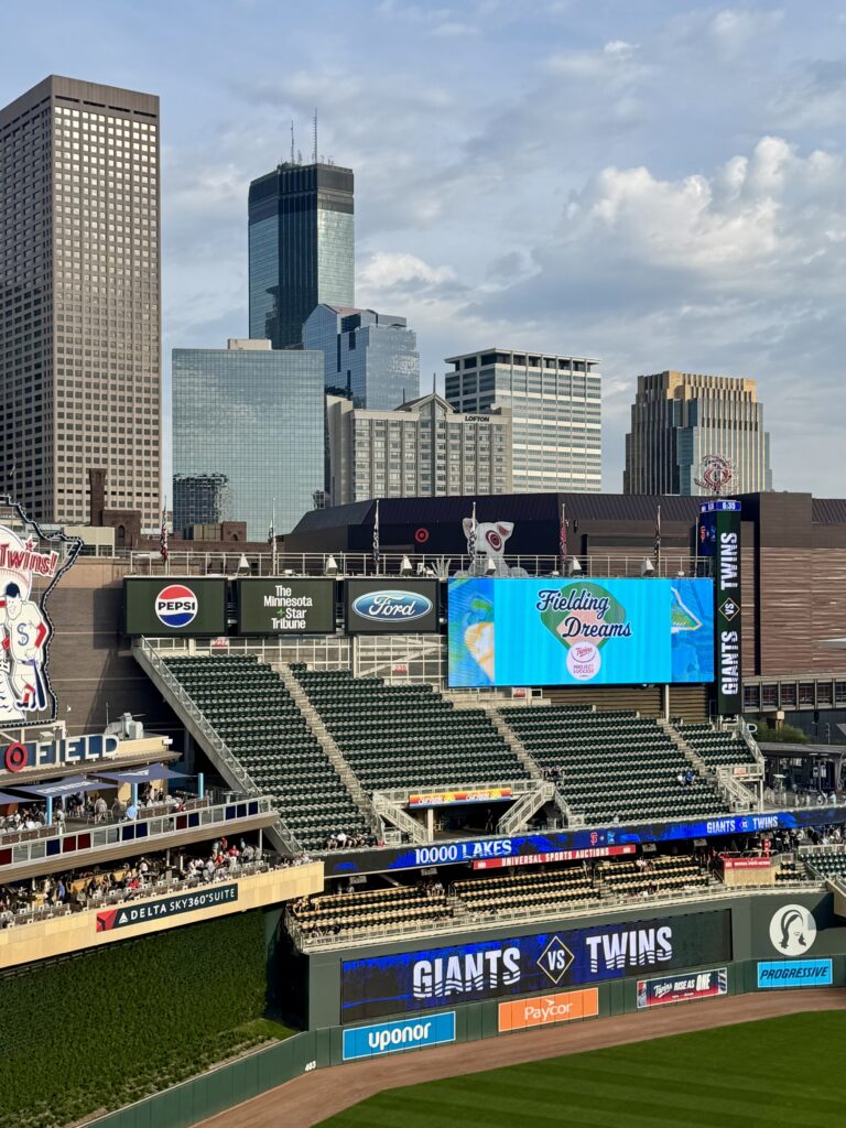 The jumbotron at the Twins Stadium with the Fielding Dream logo on the screen.
