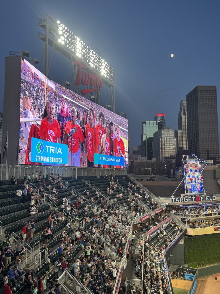 The jumbotron at Target Field with PS students on the screen.