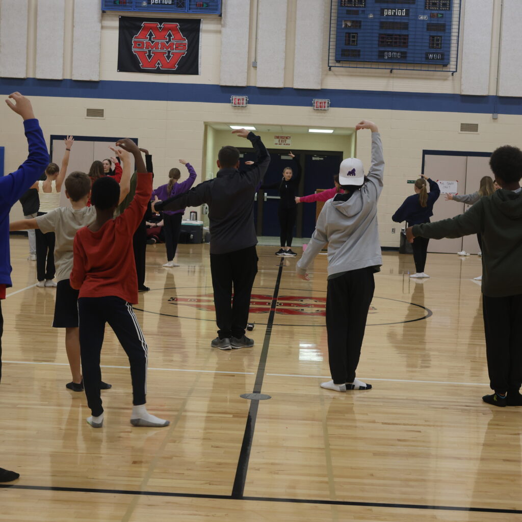 Students practicing ballet.