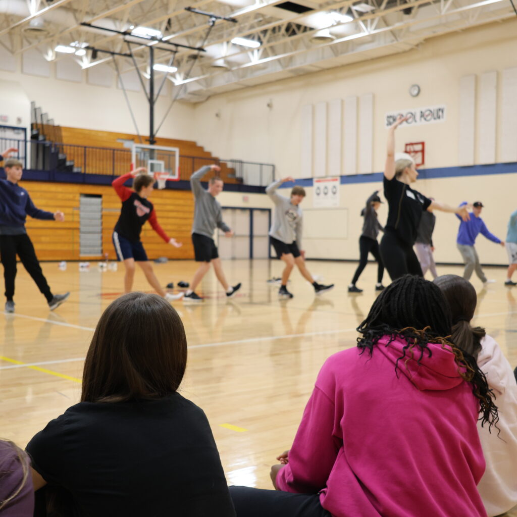 Students performing for their peers.