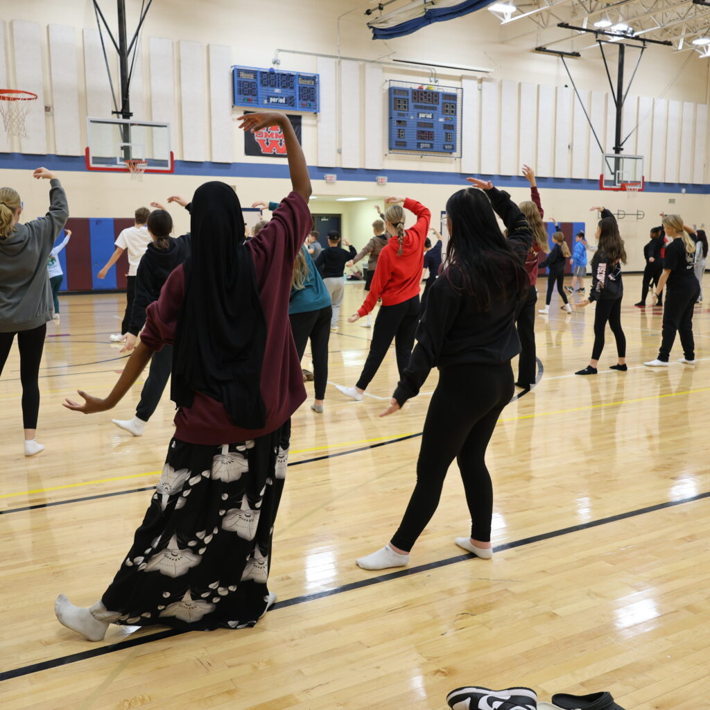 Students dancing.