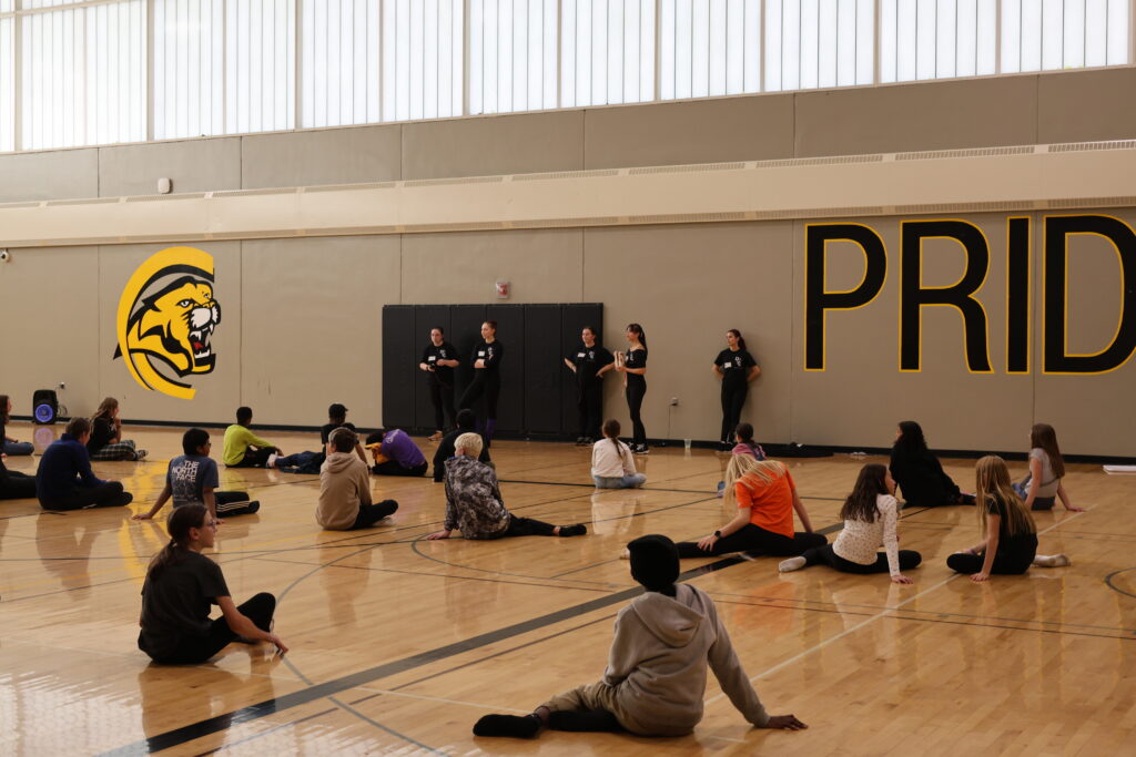 Students listening to their instructors.