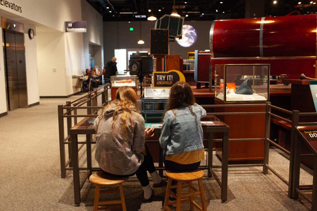Students at museum exhibit.