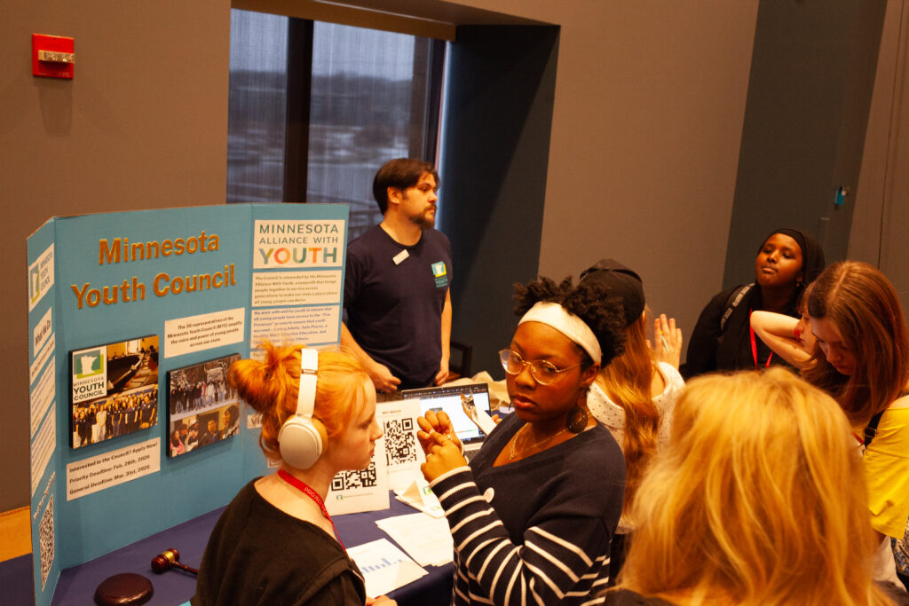 Students learning at career booth.