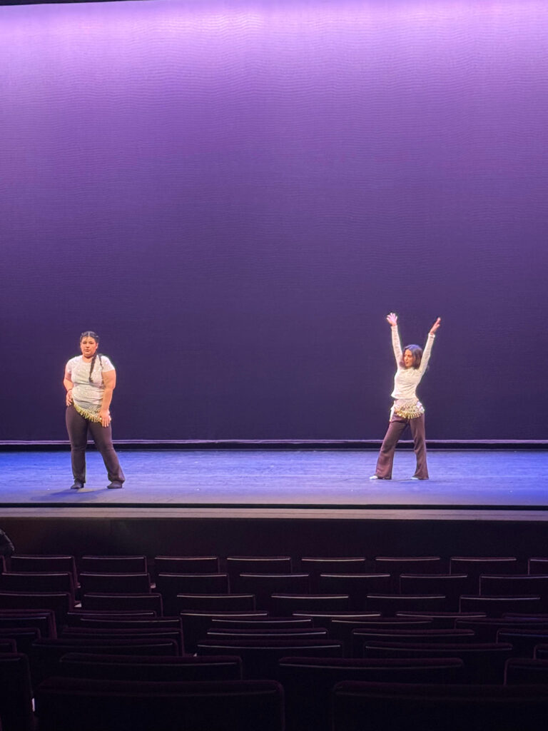 Two dancers performing.