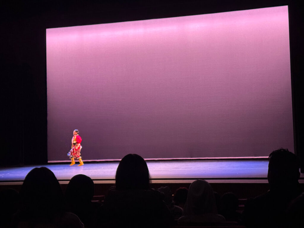 Performer dancing.