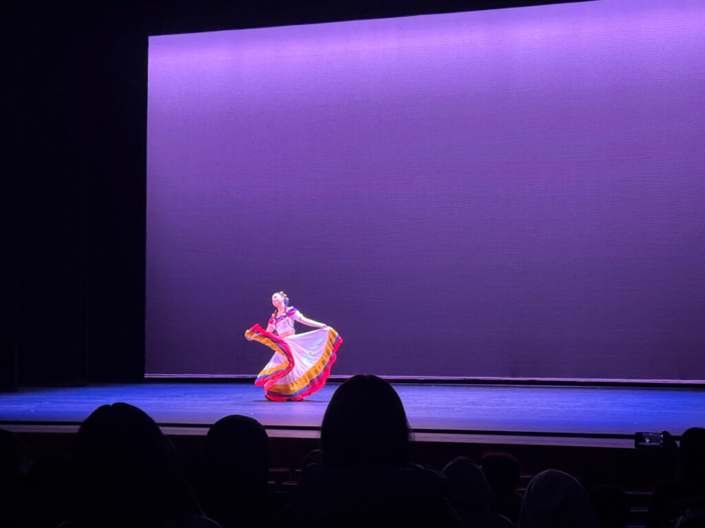 Dancer with flowing skirt.
