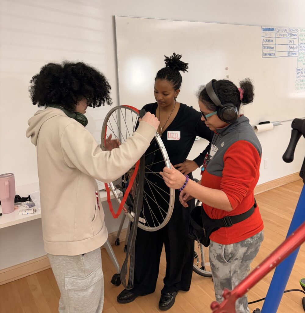 Liz and two students in the Institute.