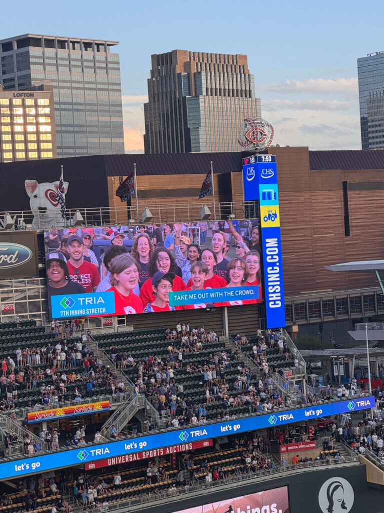 Students on jumbotron.